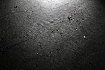 Dark grunge black concrete stone wall texture background