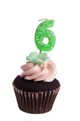 Mini cupcake with birthday candle for six year old