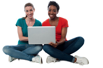 Women browsing on laptop