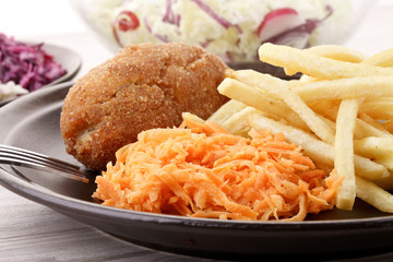 de Volaille chop with french fries and salads