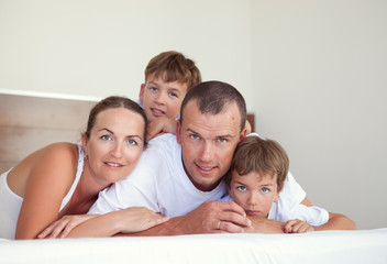 Portrait of happy family in home