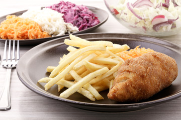 de Volaille chop with french fries and salads