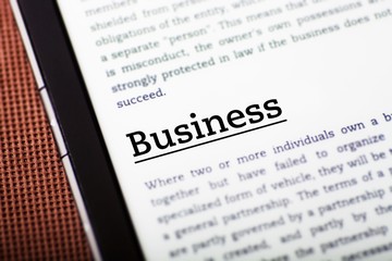 Business on tablet screen, ebook concept