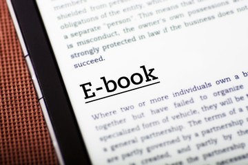 Obraz premium E-book on tablet screen, ebook concept