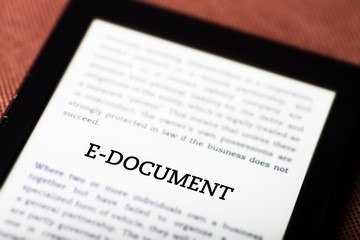 Obraz premium E-document on ebook, tablet concept