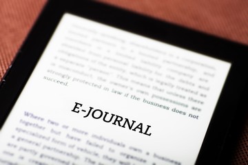 E-journal on ebook, tablet concept