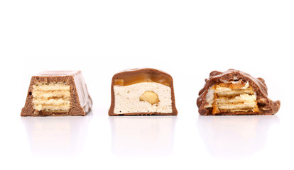 Different slices bar of chocolate. Close up.