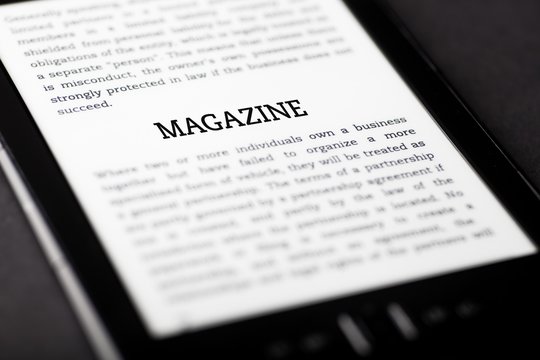 Magazine on tablet touchpad, ebook concept