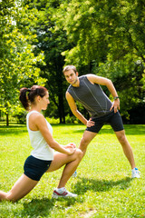 Warm up - couple exercising before jogging