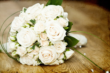 Beautiful white wedding bouquet on the floor