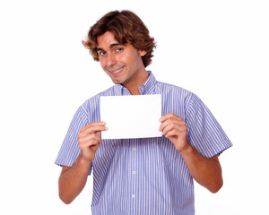 Charming young man holding a blank card