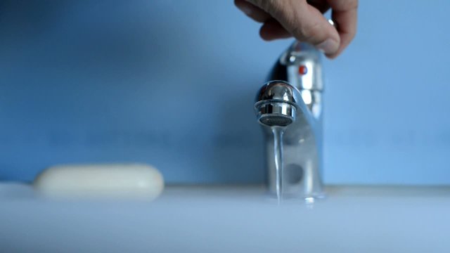 Bathroom sink with running water