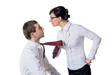 woman pulls the man for a tie