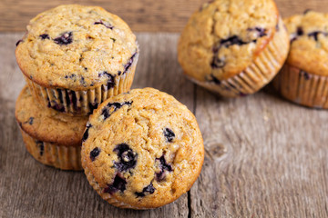 Healthy blueberry banana muffins on a wooden table