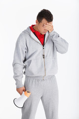 Defeat. Sad Coach with megaphone on white background