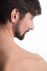 Obraz premium Guy looking away. Side profile of a handsome man looking away