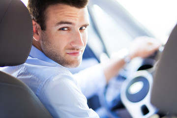 Man driving a car