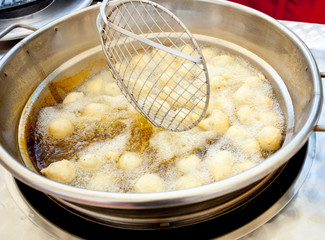 Fototapeta na wymiar Zeppulelle traditional Neapolitan food fried and salty