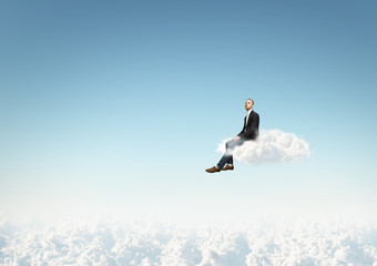 man sitting on a cloud
