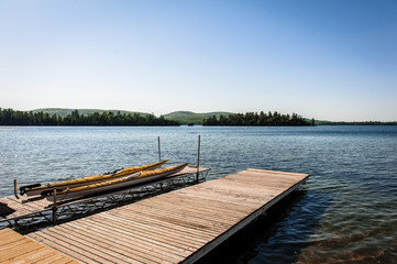 The canoes and the lake under the blue sky