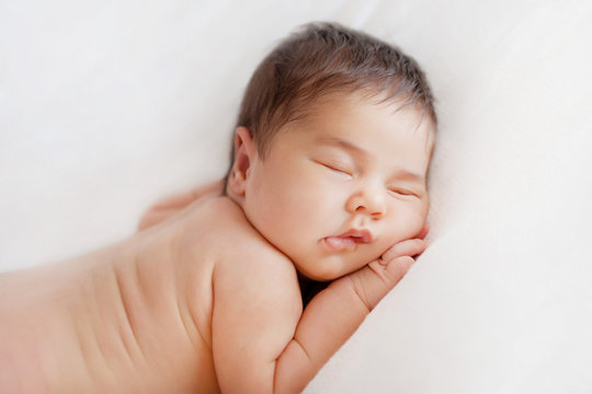 Adorable Baby Sleeping On Stomach