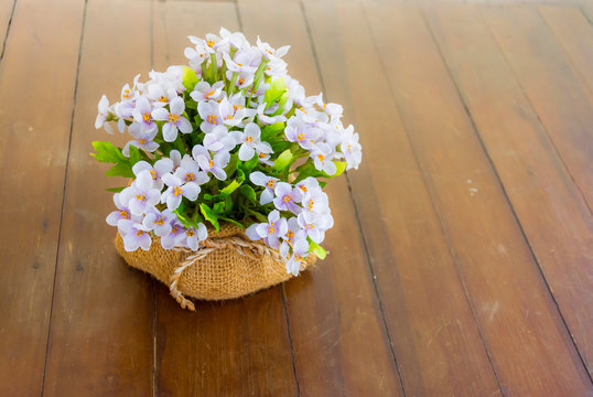 Artificial Flowers in the sack pot