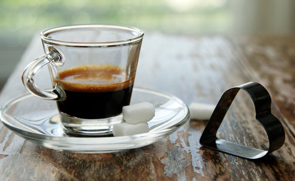 morning cup of coffee on wooden table