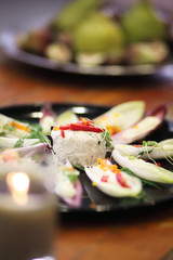 Cheese and vegetables on a tray.