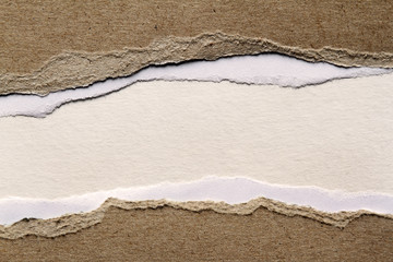 Ripped brown paper background. Copy space