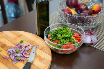 Fresh salad with onions, cucumber and parsley