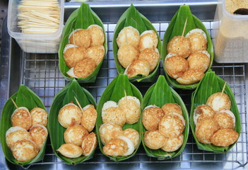 Coconut milk mix with powder fried dessert in banana leave,thai