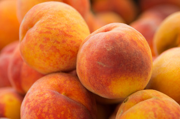 Ripe peach on pile