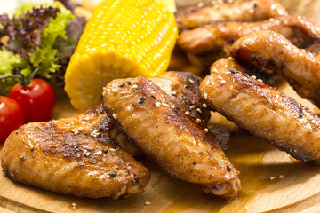 chicken wings are grilled