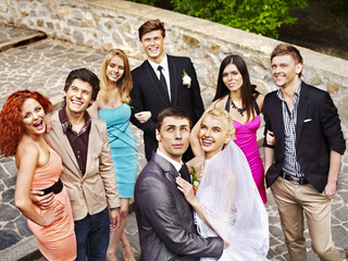 Couple at wedding outdoor.