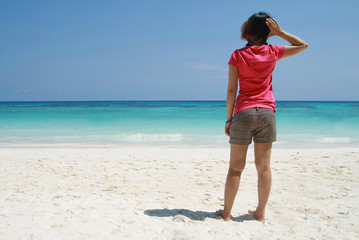 asia women stand on beach