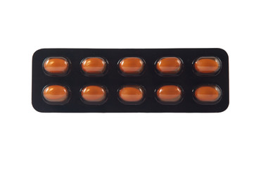 Closed up soft capsule in brown transparent blister pack