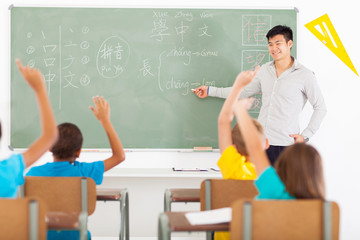 educator teaching chinese language to primary kids