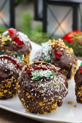 Round shape chocolate christmas cakes, decorated with jelly stri