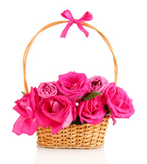 Fototapeta na wymiar Beautiful pink roses in basket isolated on white
