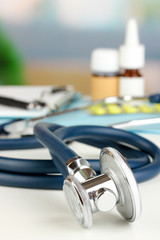 Stethoscope lying on the table close up