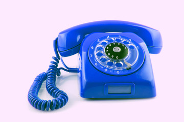 old BLue telephone with rotary dial