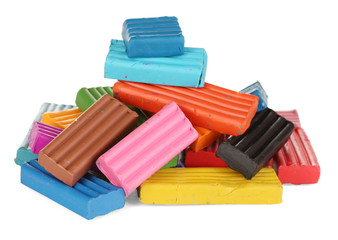 Children bright plasticine isolated on white