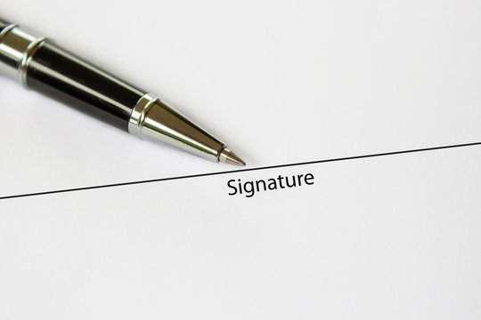 signature and pen