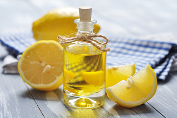 lemon oil in a glass bottle