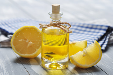 lemon oil in a glass bottle