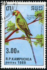 stamp printed in Cambodia shows Psittacula krameri