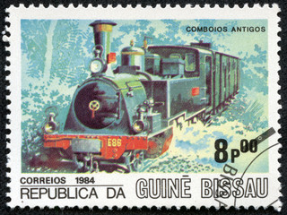 Fototapeta na wymiar stamp printed in Republic of Guinea Bissau shows engine