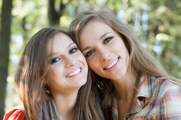 closeup of two smiling women