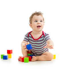 baby boy playing toy blocks  isolated on white background