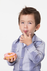 Boy eating a donut